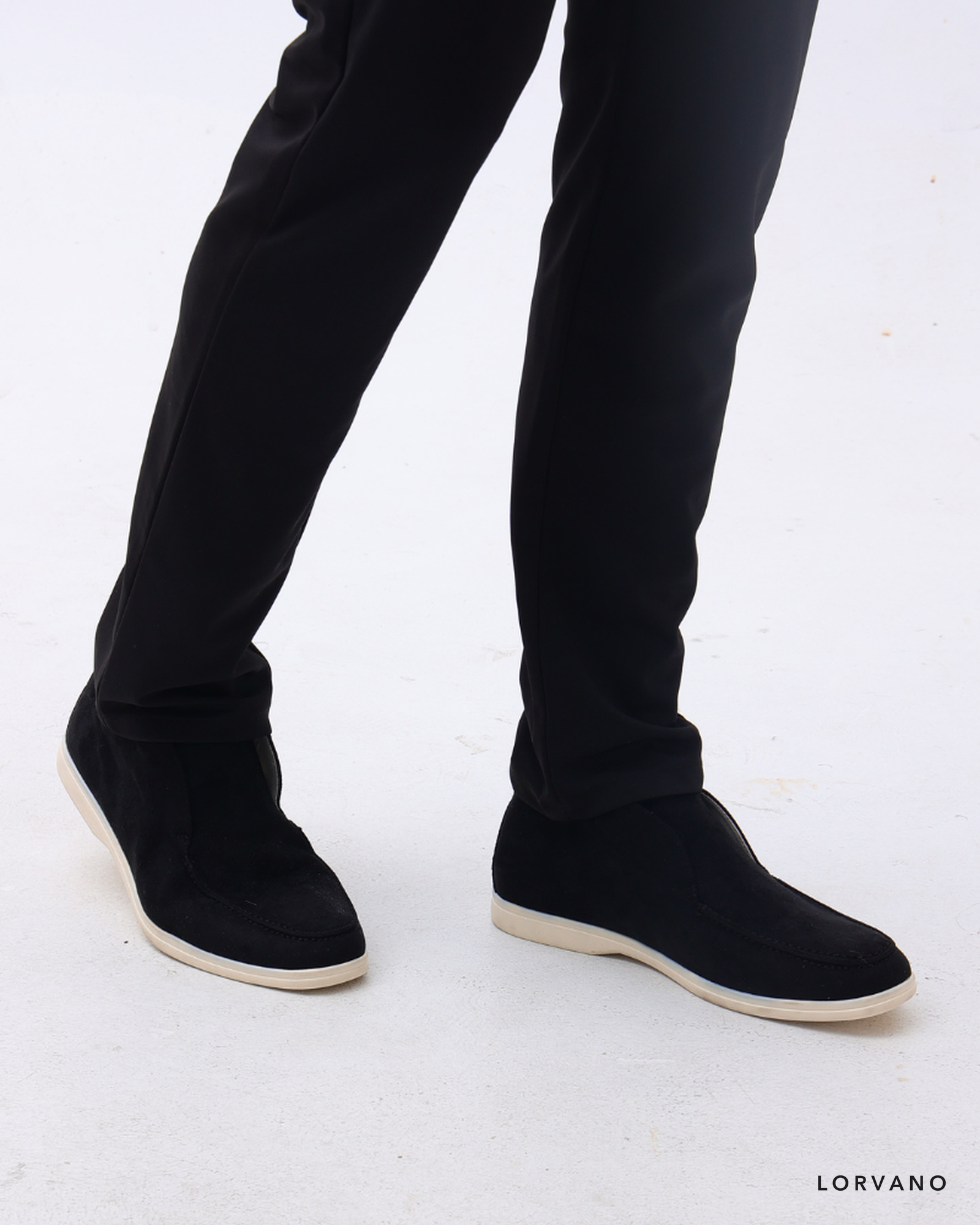 Lorvano High Suede Loafers in black suede worn, side view